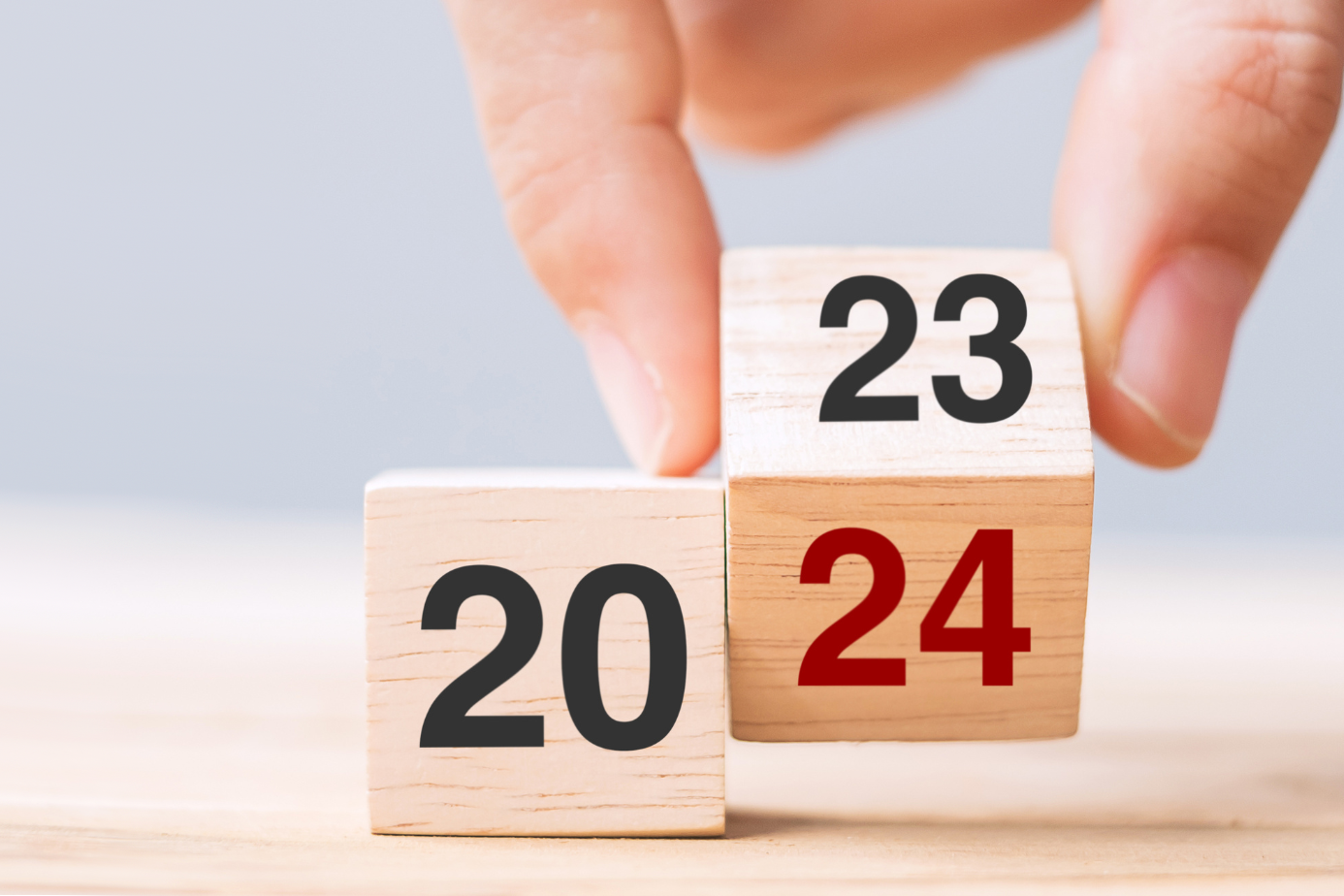 LAST WEBINAR OF 2023: Two fingers change wooden blocks from year 2023 to 2024