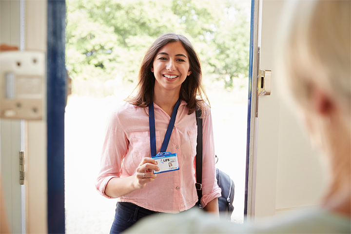 CMOR: A woman appears at the door showing her LIFEPlan badge smiling.