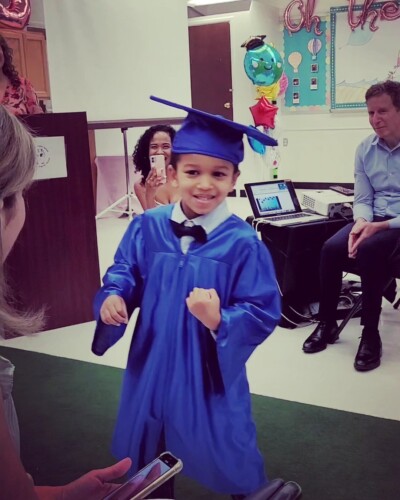 LIFEPlan Member Marcus Monroe smiling for his graduation photo.